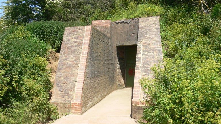Image showing brickwork repairs to the western portal of Jane 1 magazine on a sunny day